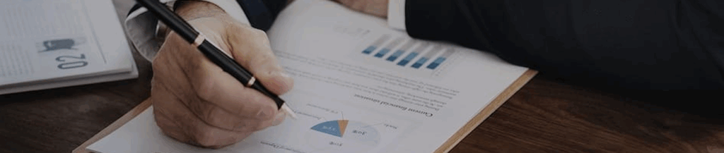 a man writing an insurance contract